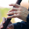 Rodrigo performing bamboo flute during the concert