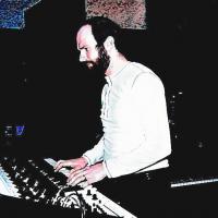 John Thomas -  John David Thomas in 1980 in  recording studio with his Oberheim synthesizer